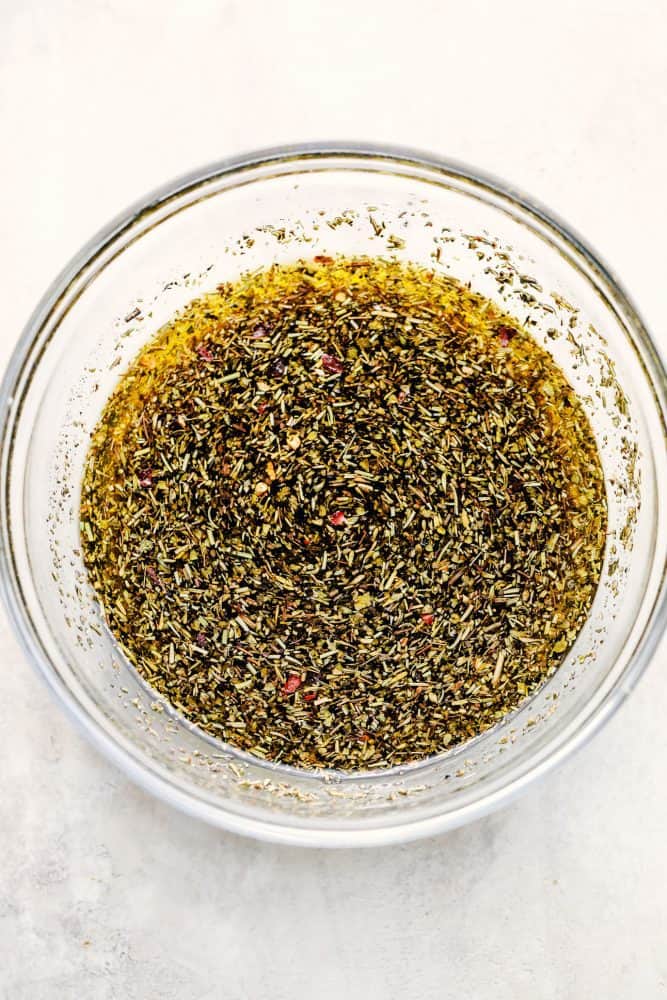 World's Best Steak Marinade adds so much flavor to your juicy steak. It helps to tenderize and infuse the steak with flavor and creates the best steak ever! World's Best Steak Marinade mixed in a clear bowl.