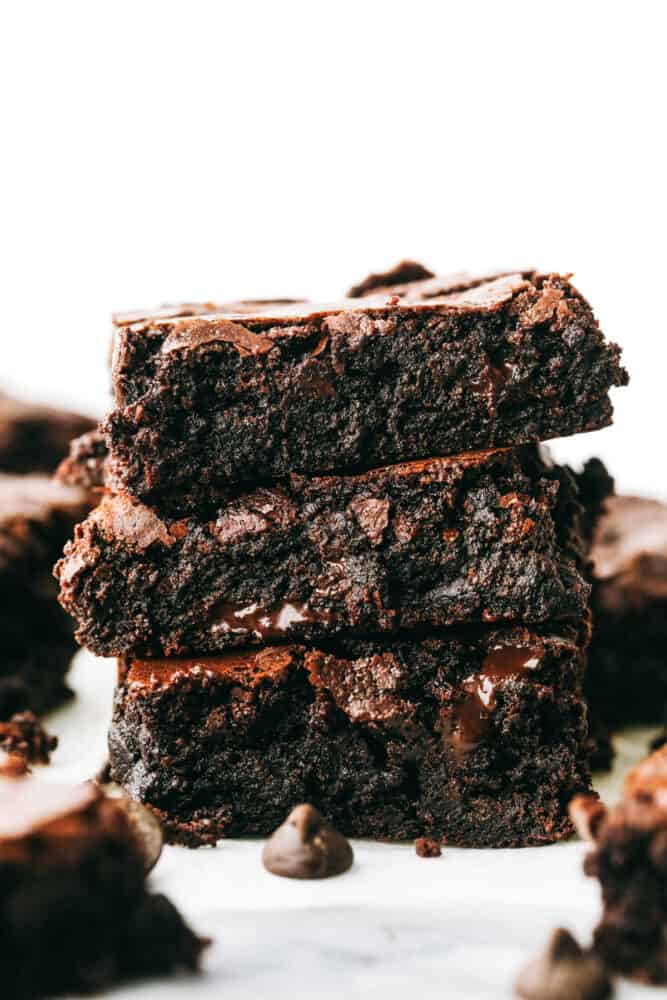 These are truly the Most Perfect Brownies Ever! These are rich, decadent and full of soul satisfying chocolate! Brownie squares are stacked on top of each other.