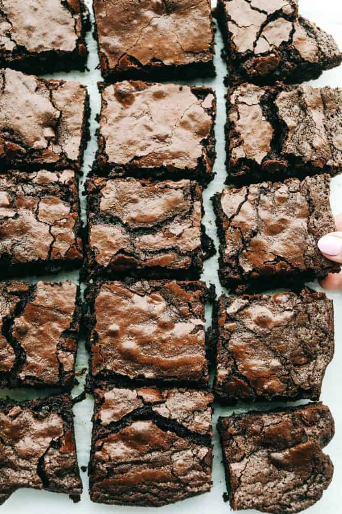 These are truly the Most Perfect Brownies Ever! These are rich, decadent and full of soul satisfying chocolate! Cut squares of brownies ready to eat.