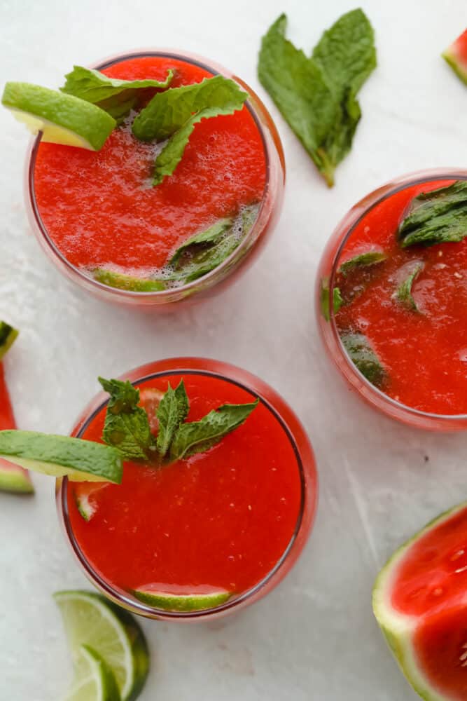 Watermelon Agua Fresca is the perfect drink to keep you cool this summer with the smooth, crisp flavor of fresh watermelon! You are going to love how crazy delicious and easy to make this is! Watermelon agua fresca served in glasses with garnish