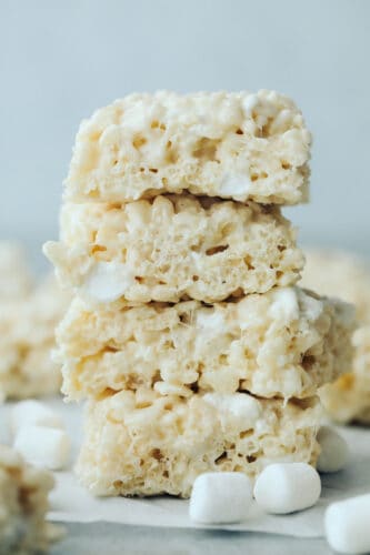 Everyone loves a good rice krispie treat. Sweet, soft, and extra ooey gooey, these Perfect Rice Krispie Treats will become your new favorite! Four rice krispies in a stack