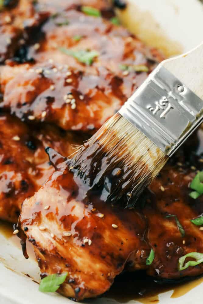Grilled Teriyaki Chicken is the ultimate quick and easy, absolutely delicious dinner! Tender juicy chicken is soaked in the BEST Teriyaki Sauce then grilled to perfection Basting the rest of the teriyaki sauce onto cooked chicken.