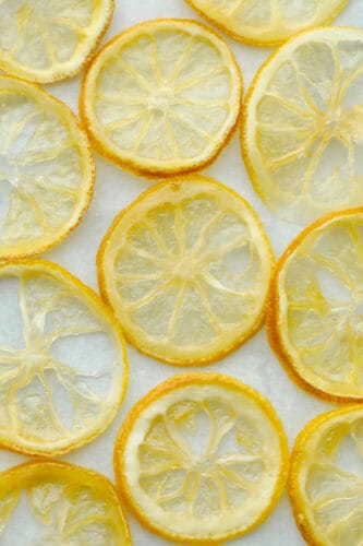 Candied Lemon Slices are super easy and a delicious way to decorate your favorite lemon foods. These lemon slices are so good you may just eat them before they get a chance to be a decoration! Dried candied lemon slices.