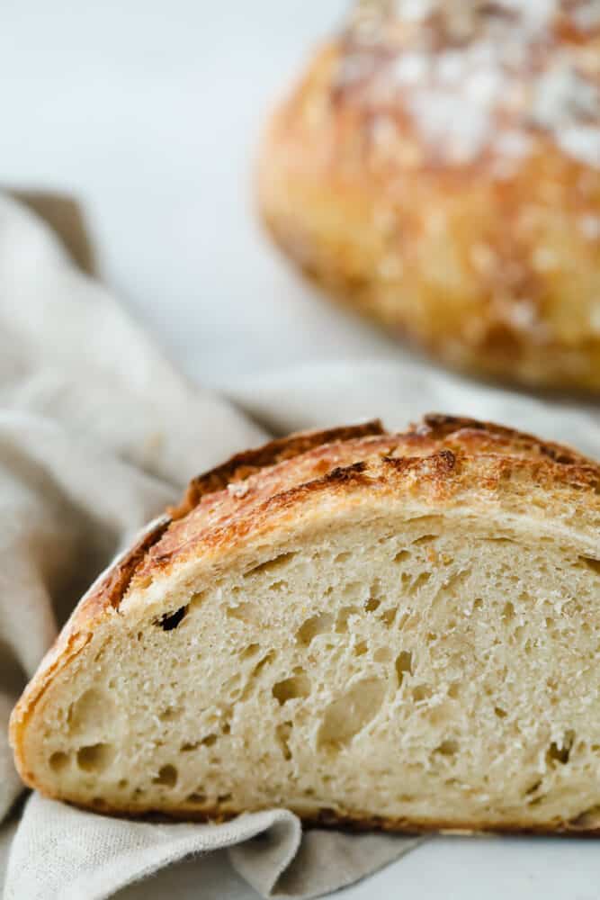 Sourdough Bread is one of the most flavorful, good-for-you loaves of bread out there. Easier than you think with a taste and texture that is absolutely heavenly! Perfectly light and airy sourdough bread.