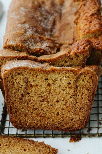 Amish Friendship Bread is the gift that keeps on giving! This simple starter yields sweet, delicious bread every time! Close-up of Amish Friendship Bread, sliced.