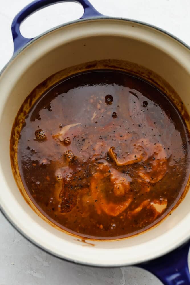 Rich, sweet, and salty, hoisin sauce is the perfect foundation for all of your Asian-inspired dishes. This homemade variation packs so much delicious flavor, you won't want store-bought again! Hoisin ingredients cooking together in a saucepan.