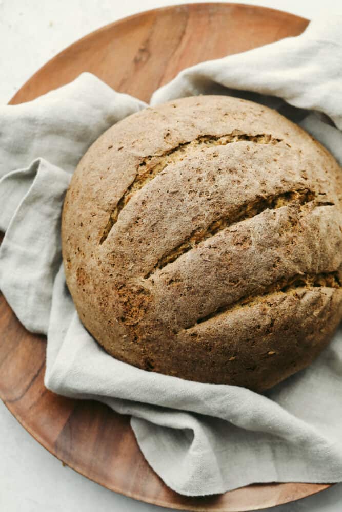 Rye Bread is a soft light loaf of heavenly flavor and a crust that's to die for! Super easy and wholesome, you and your loved ones are going to love this homemade bread! Freshly baked rye bread.