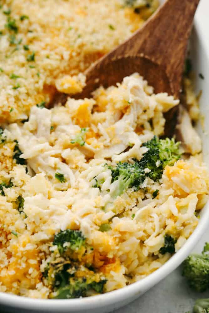 Broccoli and rice chicken casserole is a delicious, easy, family-friendly dish! It is creamy and filled with flavors that perfectly complement each other! You will love it! A zoomed in picture of broccoli and rice chicken casserole.