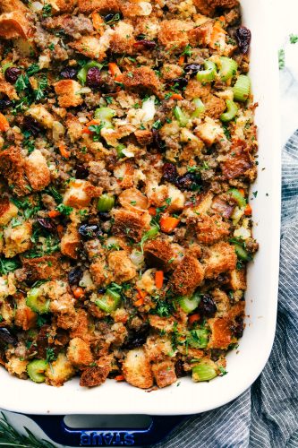Grandma's sausage herb stuffing is a classic side dish! Baked bread, tender sausage, and crunchy vegetables are all mixed with flavorful herbs and baked until golden brown. It makes my mouth water just thinking about it! Sausage Herb Stuffing in a dish
