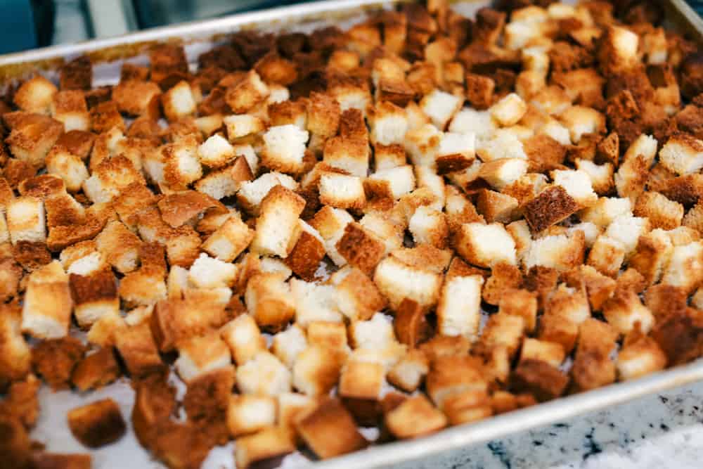 Grandma's sausage herb stuffing is a classic side dish! Baked bread, tender sausage, and crunchy vegetables are all mixed with flavorful herbs and baked until golden brown. It makes my mouth water just thinking about it! baked bread