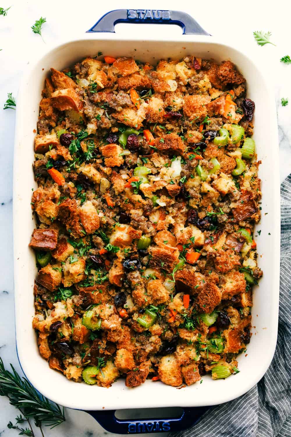Grandma's Sausage Herb Stuffing is always a classic side dish with soft baked bread, tender sausage, crunchy vegetables, Stuffing is the perfect addition to your thanksgiving feast! baked sausage herb stuffing
