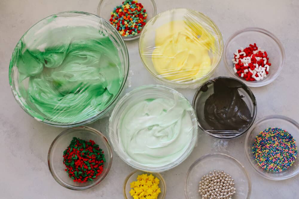 If you're wanting a dessert that is both festive and delicious, look no further! These Christmas tree sugar cookies will shine at any holiday party! Various frosting colors and sprinkles.