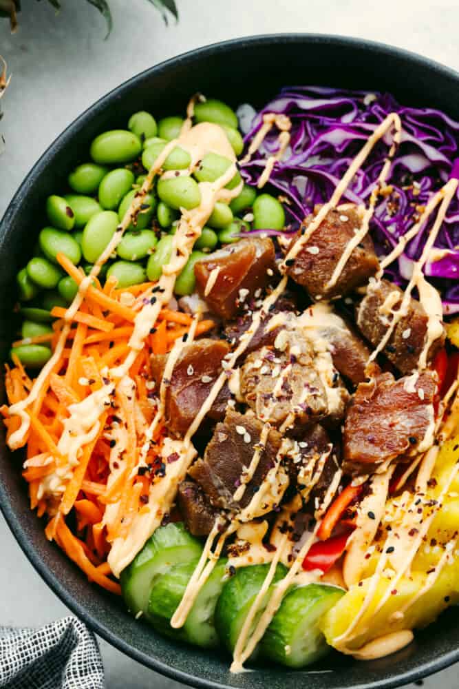 This Hawaiian poke bowl is fantastically fresh and full of healthy ingredients! Skip ordering this at a restaurant and make it at home in less than 15 minutes! A close up of a Hawaiian poke bowl.