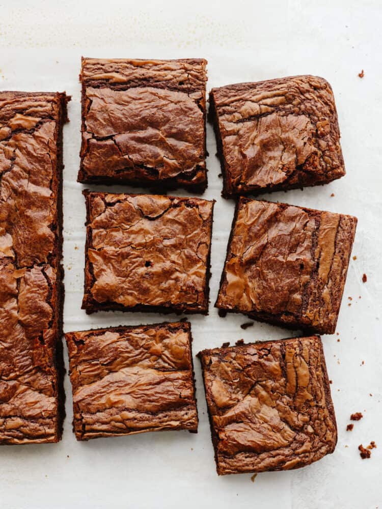 This super easy 3-ingredient brownie recipe is the only one you'll ever need! These brownies are rich and fudgy, the perfect solution for when you're craving chocolate! Top-down view of 3-ingredient Nutella brownies cut into 6 pieces.